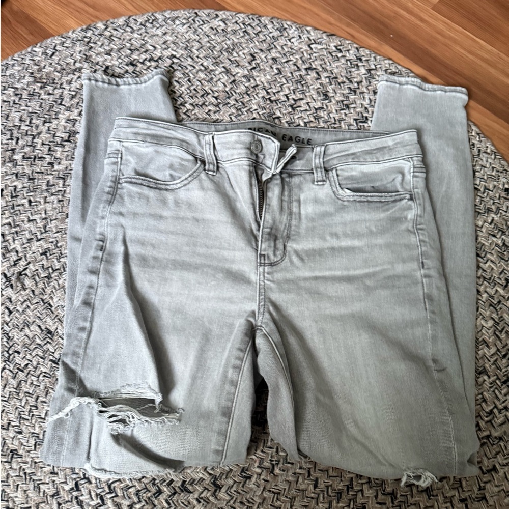 American Eagle Outfitters Light Gray Skinny Jeans with Distressed Knee